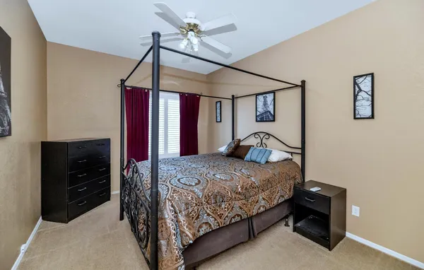 a view of walk in closet with window and outside view