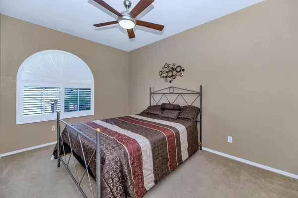 a living room with a flat screen tv and a fireplace