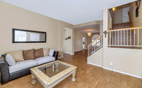 a view of a backyard with sitting area