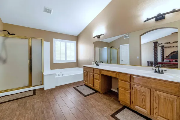 a front view of a house with a yard and porch