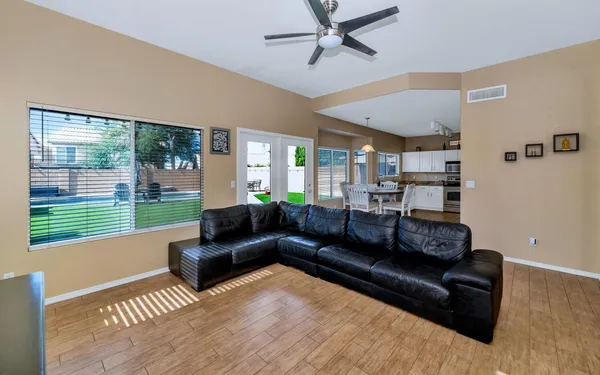 a living room with furniture and a window