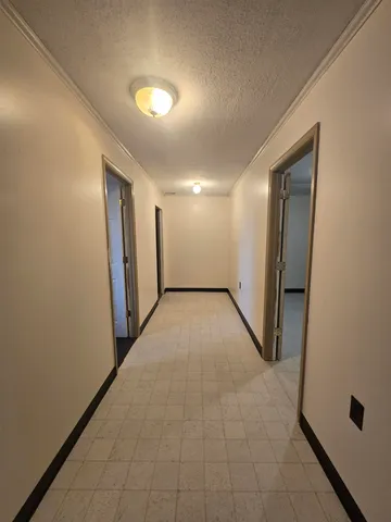 a view of a closet in a bathroom