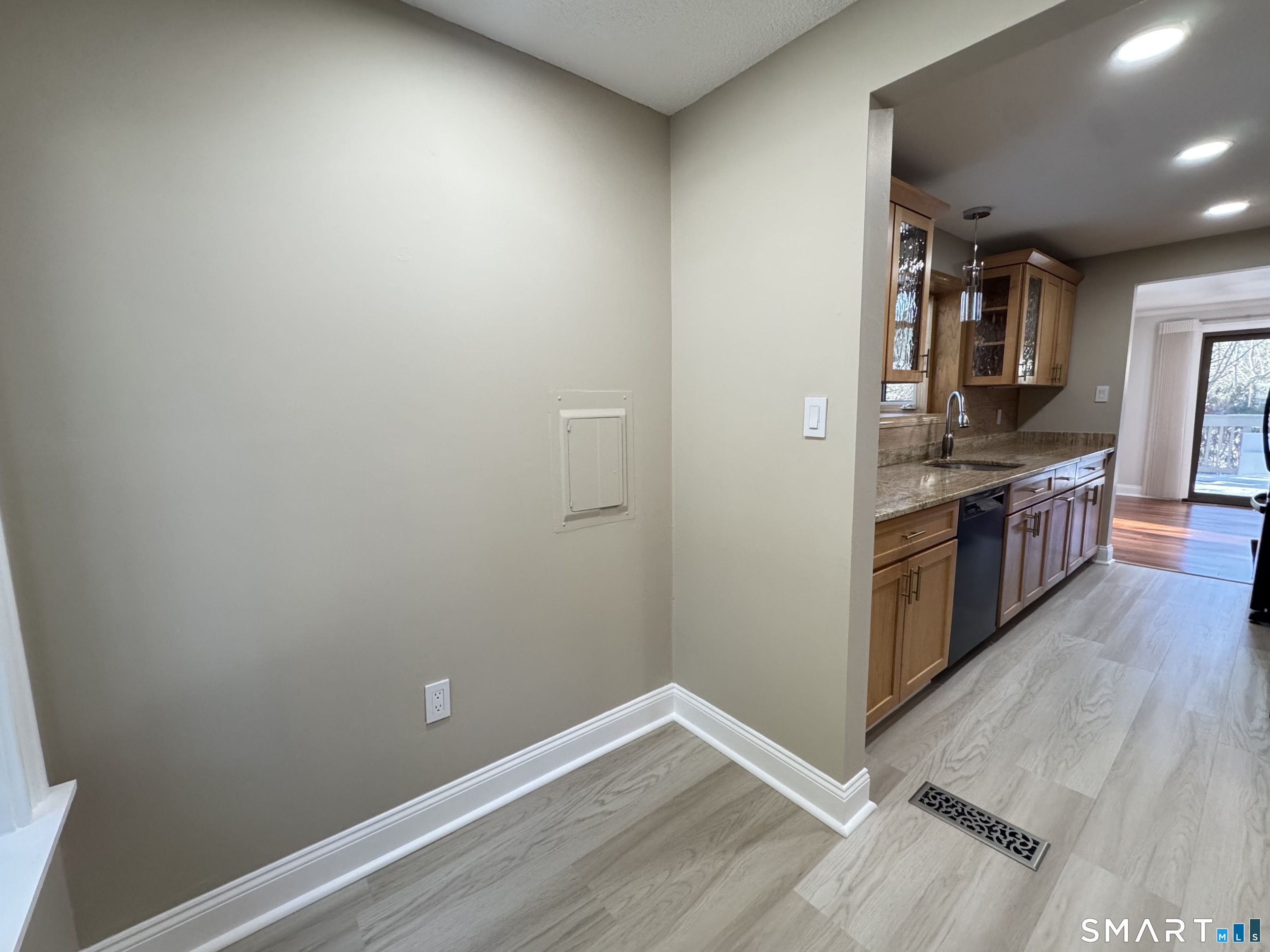 2 Highland Square, Unit 2 Avon, CT 06001 - Photo 11 of 40 a view of kitchen with wooden floor
