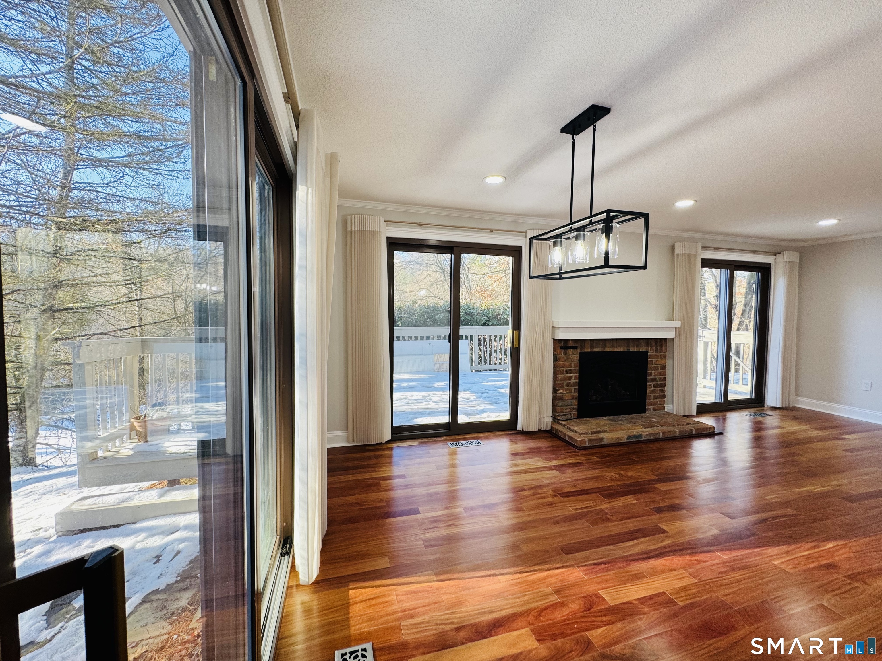 2 Highland Square, Unit 2 Avon, CT 06001 - Photo 15 of 40 a view of an empty room with glass door and balcony
