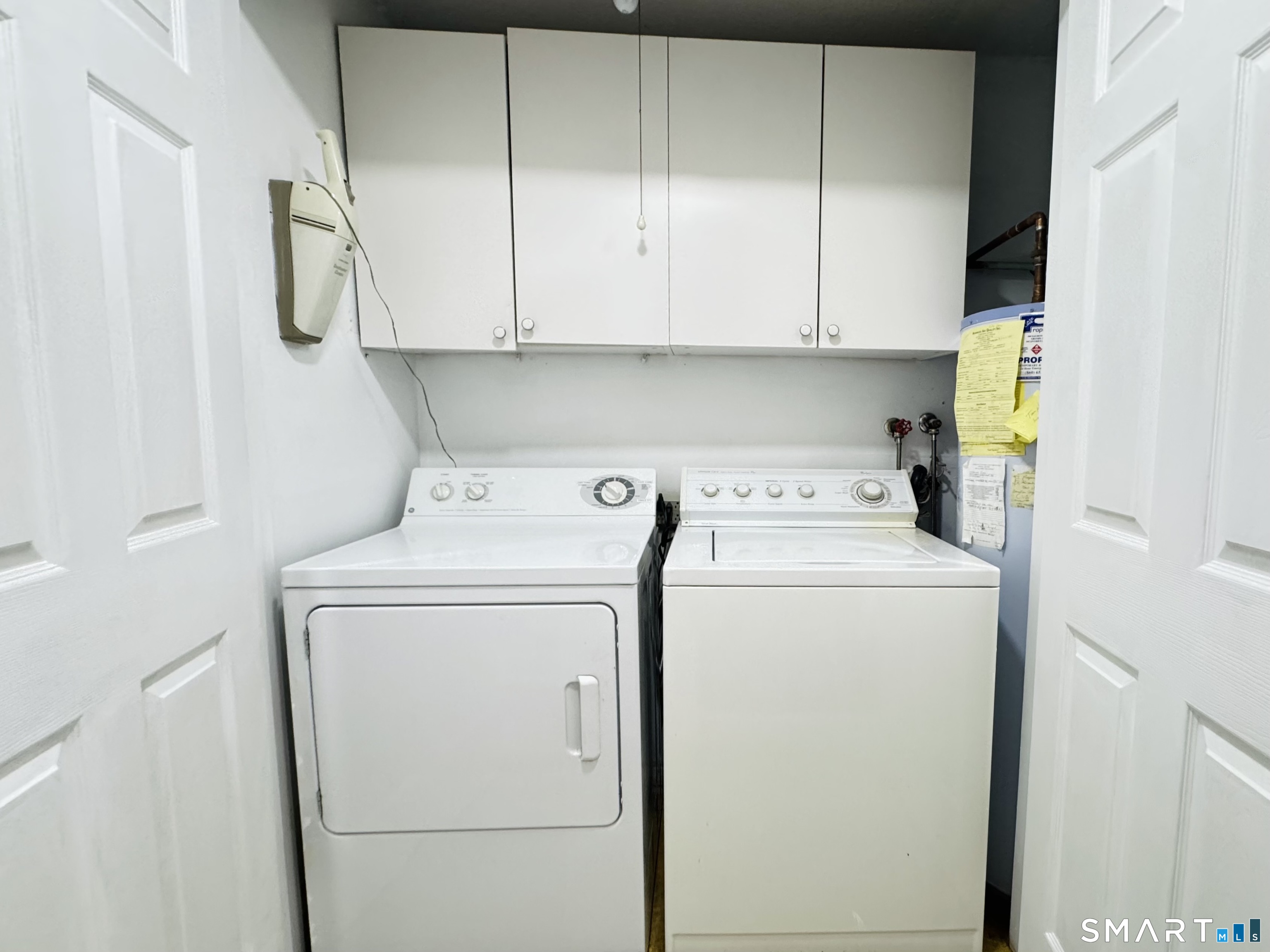 2 Highland Square, Unit 2 Avon, CT 06001 - Photo 19 of 40 a utility room with dryer and washer