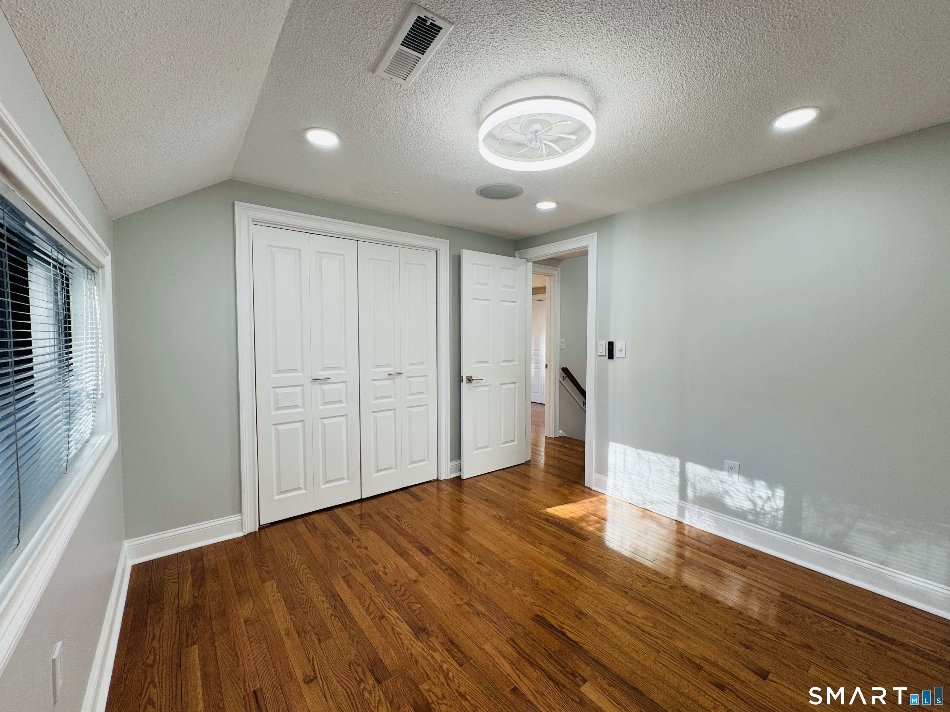2 Highland Square, Unit 2 Avon, CT 06001 - Photo 31 of 40 a view of empty room with wooden floor