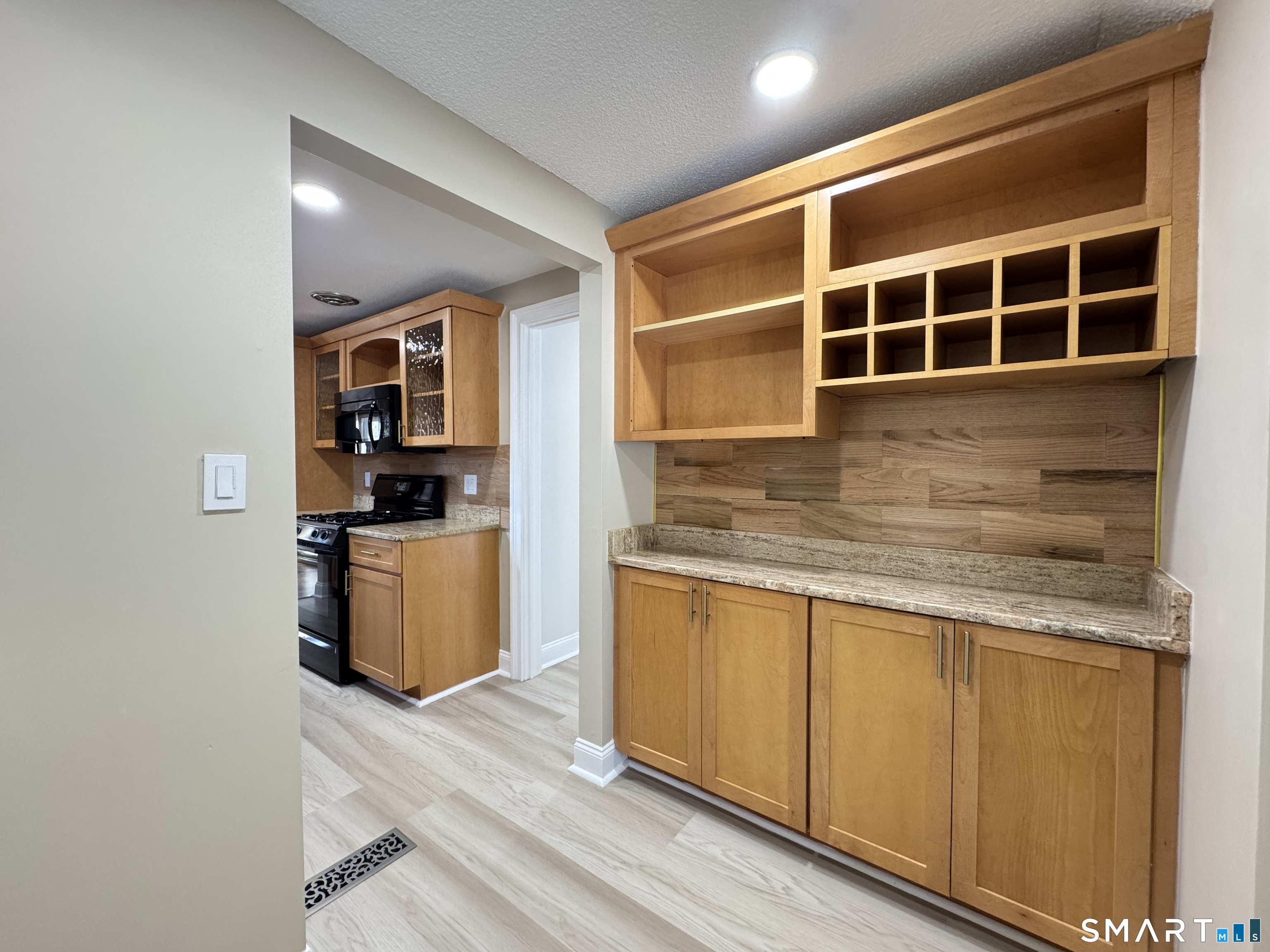 2 Highland Square, Unit 2 Avon, CT 06001 - Photo 9 of 40 a view of cabinets and window