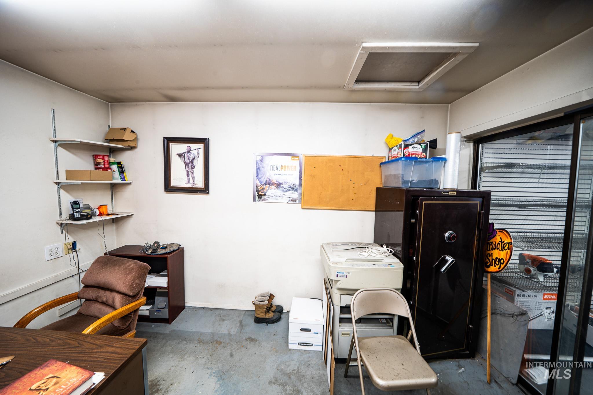 10 Main Street South Pierce, ID 83546 - Photo 11 of 27 Misc room with attic access and a desk