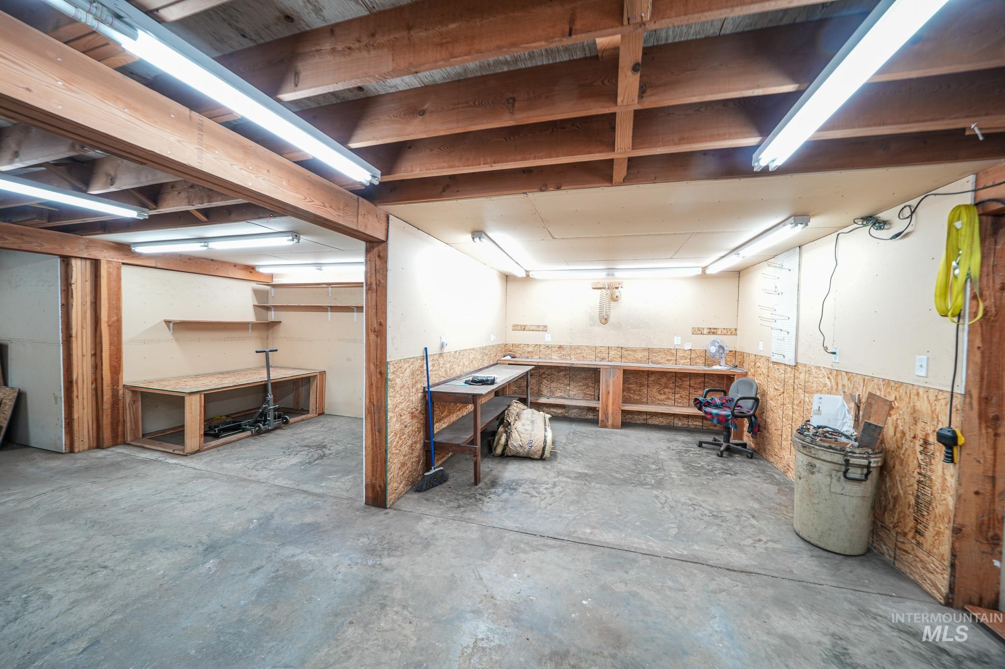 10 Main Street South Pierce, ID 83546 - Photo 25 of 27 Unfinished basement featuring a workshop area