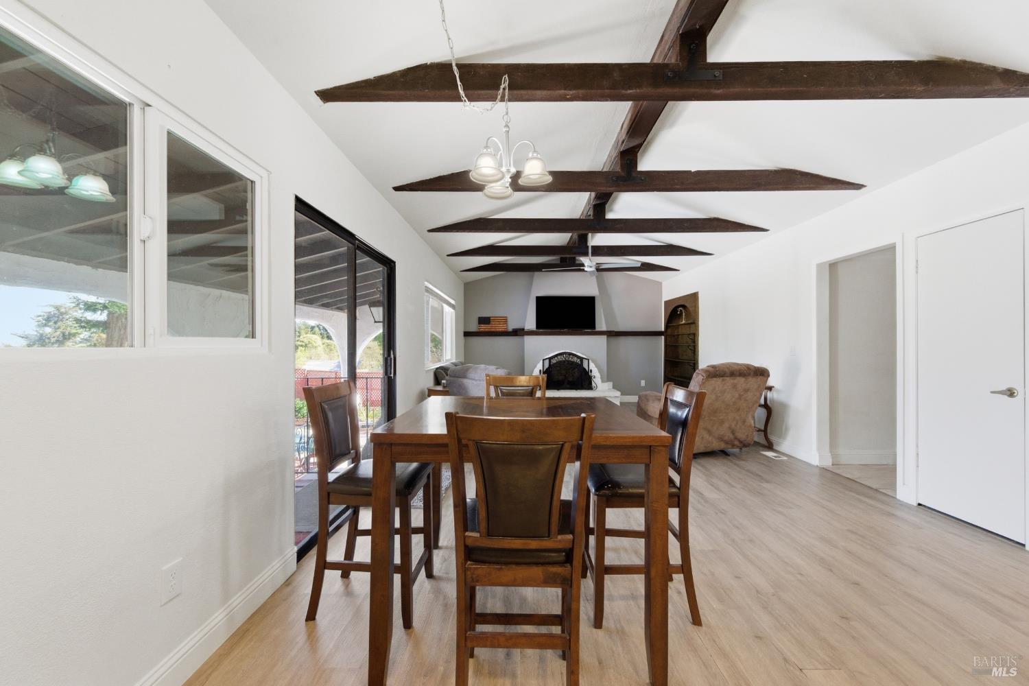 5174 Blank Road Sebastopol, CA 95472 - Photo 11 of 48 a view of a dining room with furniture and wooden floor