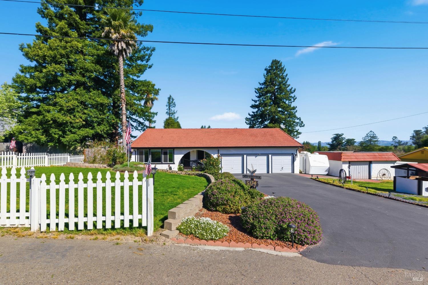 5174 Blank Road Sebastopol, CA 95472 - Photo 4 of 48 a front view of a house with a garden