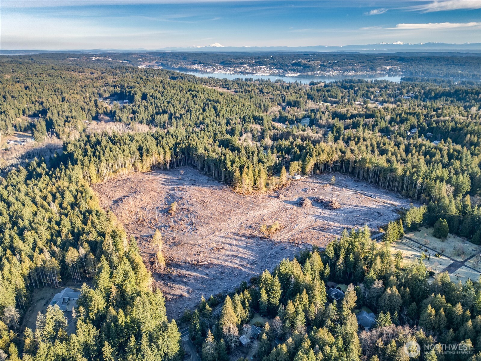 0 Northeast Mountain View Road Poulsbo, WA 98370 - Photo 16 of 17 an aerial view of residential houses with outdoor space