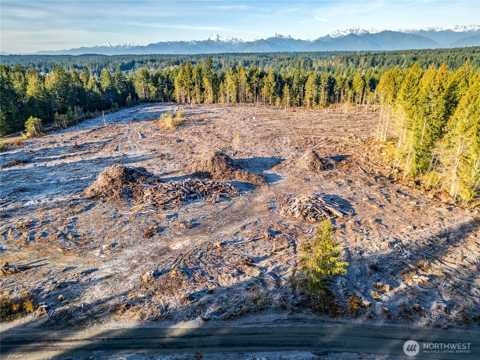 0 Northeast Mountain View Road Poulsbo, WA 98370 - Photo 4 of 17 a street view with beach and lake view