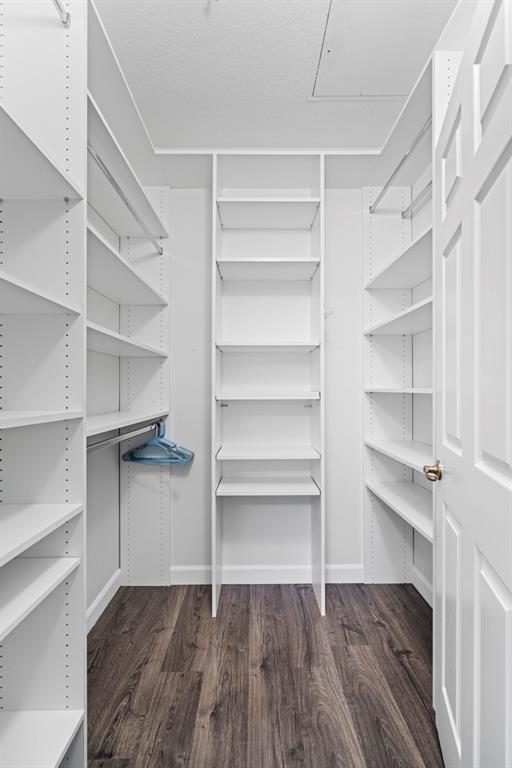 4784 Central Boulevard, Unit 22 Jupiter, FL 33458 - Photo 8 of 18 a view of walk in closet with empty racks