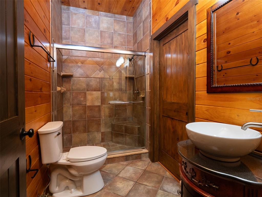 12100 Northwest 110th Avenue Reddick, FL 32686 - Photo 20 of 38 a bathroom with a toilet and a shower