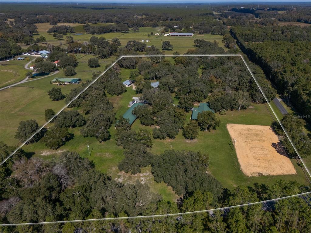 12100 Northwest 110th Avenue Reddick, FL 32686 - Photo 2 of 38 an aerial view of house with yard