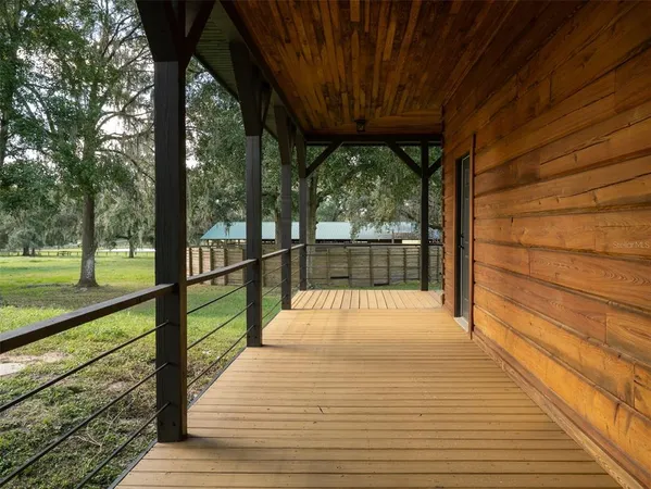 a view of porch with a swimming pool