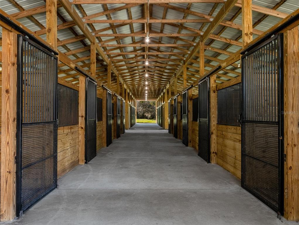 12100 Northwest 110th Avenue Reddick, FL 32686 - Photo 28 of 38 a view of water heater room with stairs