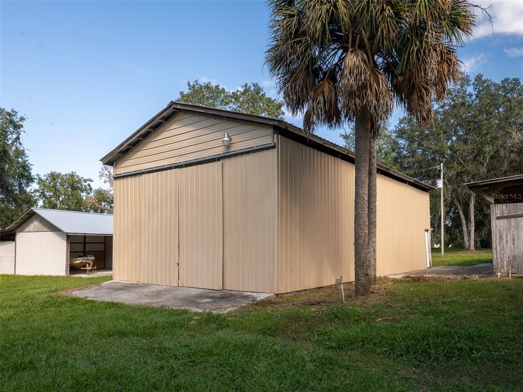 12100 Northwest 110th Avenue Reddick, FL 32686 - Photo 36 of 38 a house view with a garden space
