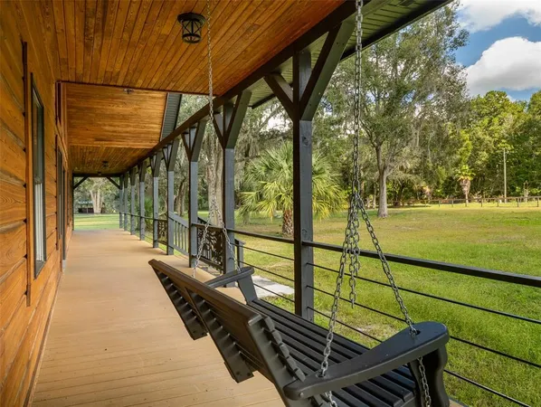 a view of a chairs and table on the wooden floor