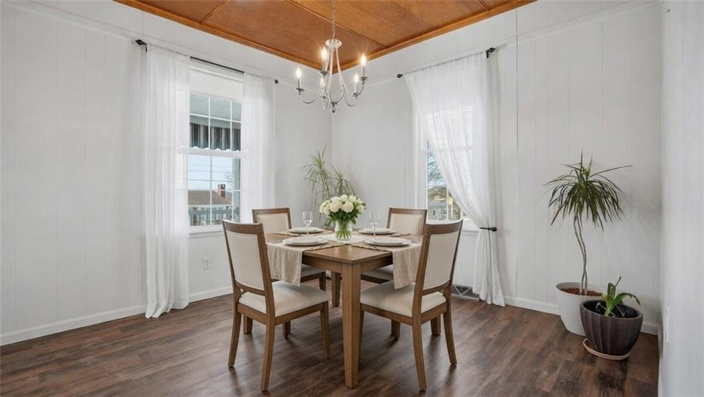 1105 Linden Street Monaca, PA 15061 - Photo 22 of 45 a view of a dining room with furniture window and wooden floor