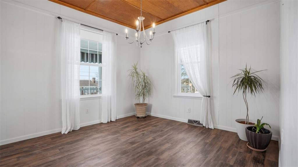 1105 Linden Street Monaca, PA 15061 - Photo 24 of 45 a view of a hallway with wooden floor and a window