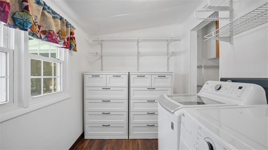 1105 Linden Street Monaca, PA 15061 - Photo 33 of 45 a utility room with cabinets washer and dryer