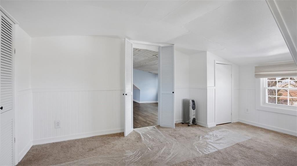 1105 Linden Street Monaca, PA 15061 - Photo 39 of 45 an empty room with windows and closet