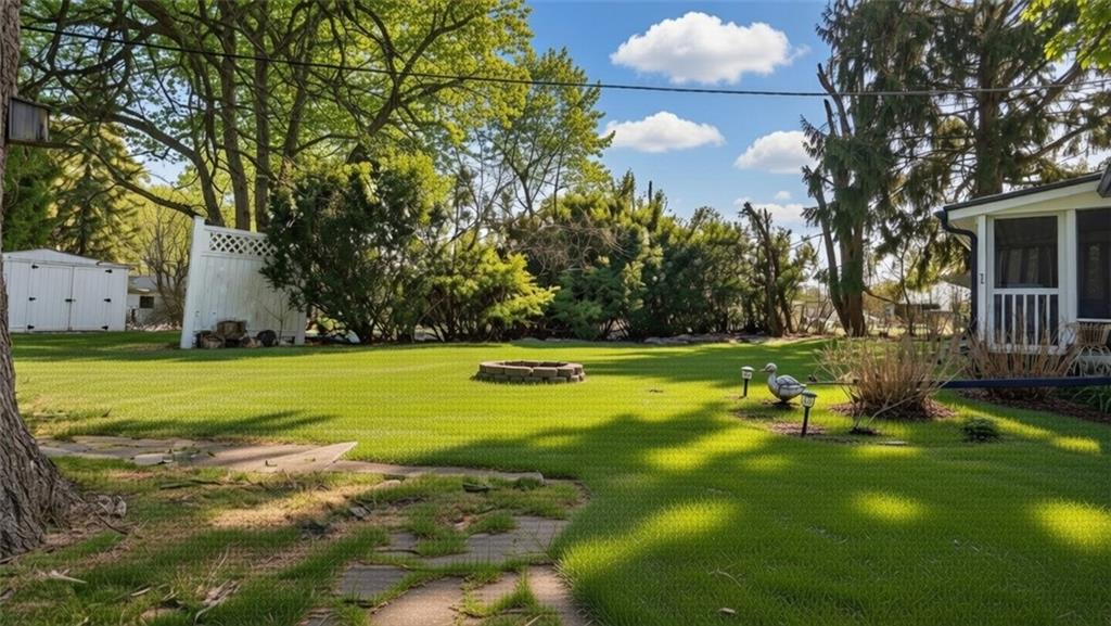 1105 Linden Street Monaca, PA 15061 - Photo 10 of 45 a view of yard with swimming pool and green space