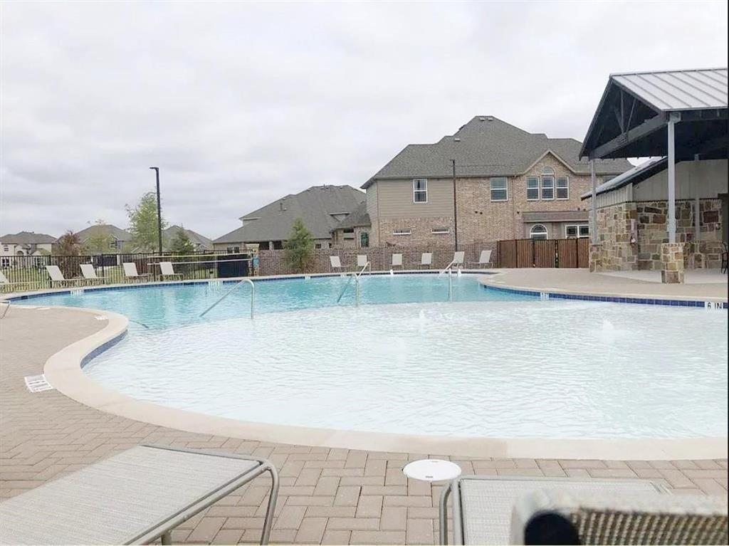3817 Bennett Trail Celina, TX 75009 - Photo 20 of 22 a view of a house with a yard and lake view