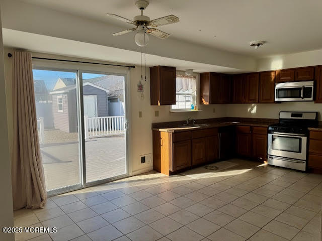 38 Cabana Drive Brick, NJ 08723 - Photo 5 of 19 a kitchen with stainless steel appliances granite countertop a stove and a refrigerator
