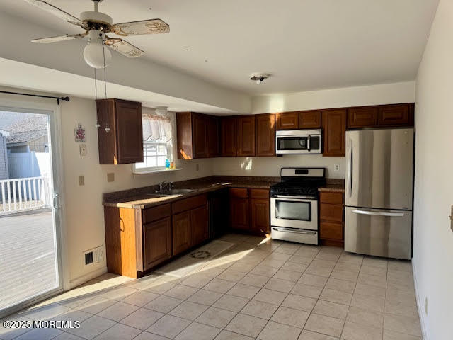 38 Cabana Drive Brick, NJ 08723 - Photo 6 of 19 a kitchen with granite countertop a refrigerator stove top oven and sink