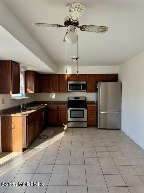38 Cabana Drive Brick, NJ 08723 - Photo 8 of 19 a kitchen with stainless steel appliances and a refrigerator