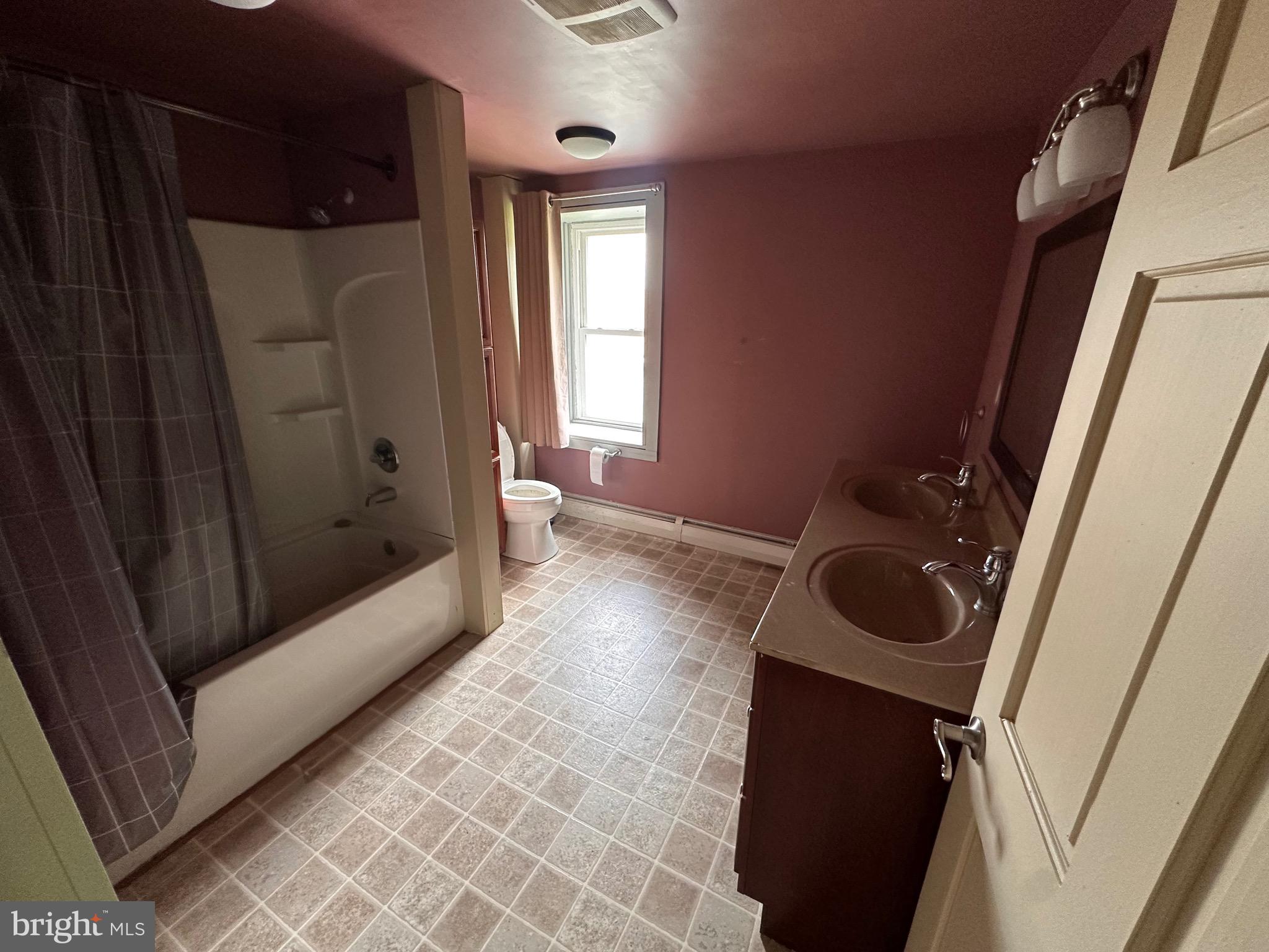 92 Deysher Road Fleetwood, PA 19522 - Photo 12 of 12 a bathroom with a bathtub and shower