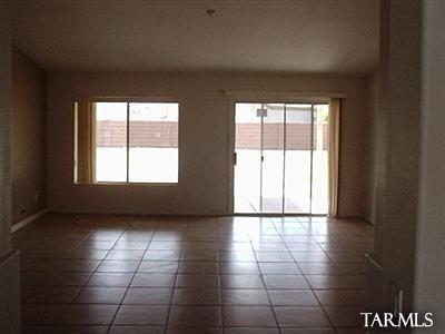 76 Highland Circle Rio Rico, AZ 85648 - Photo 2 of 5 a view of an empty room and a window