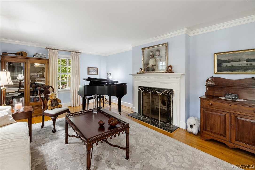 2731 Arrandell Road Midlothian, VA 23113 - Photo 7 of 30 a living room with furniture and a fireplace