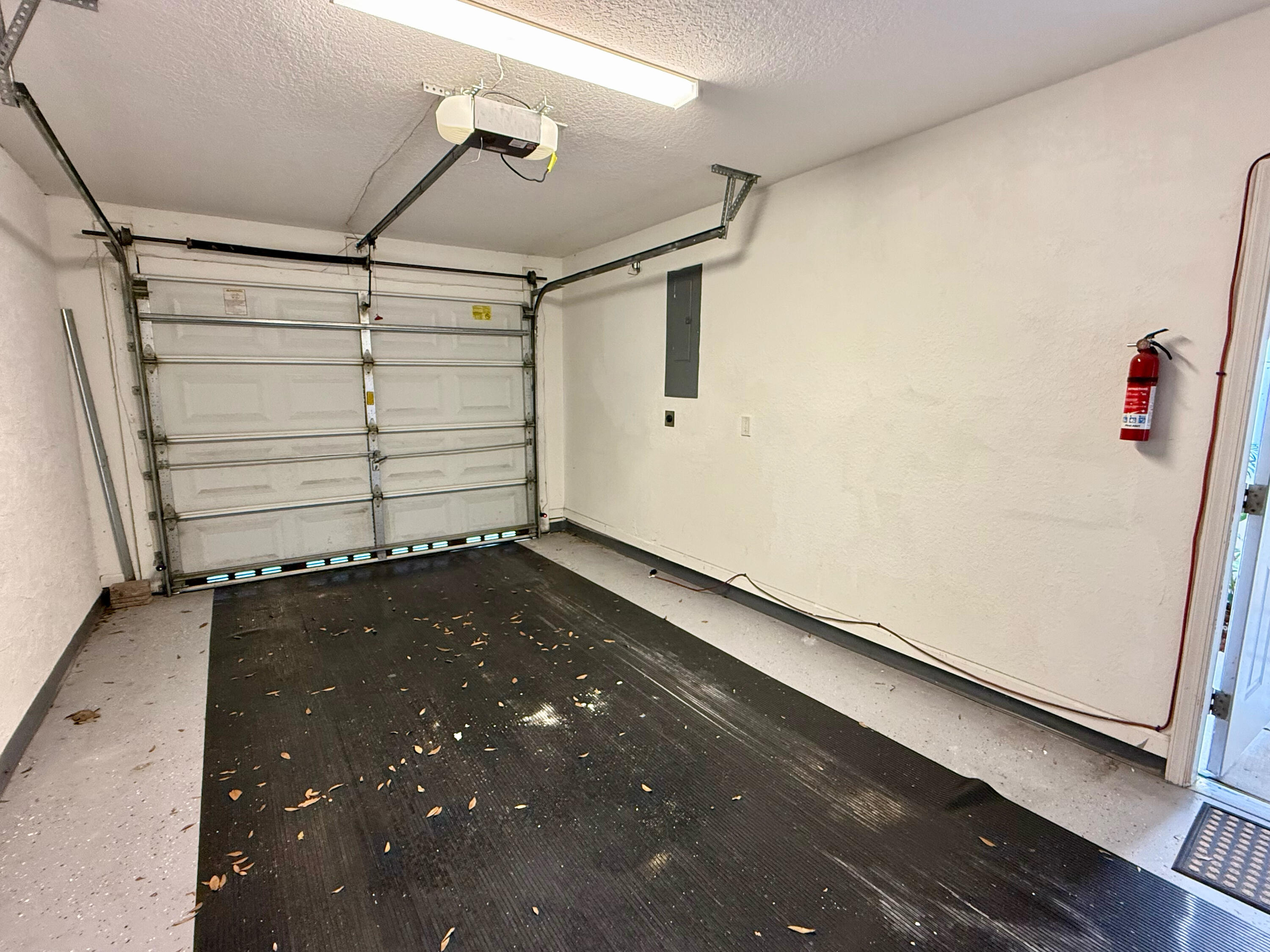 12813 Woodmill Drive Palm Beach Gardens, FL 33418 - Photo 13 of 30 a view of a room with wooden walls