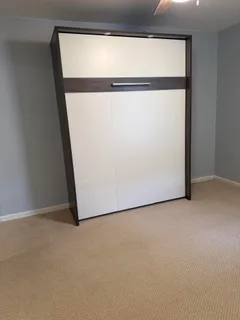 a view of small space with wooden floor