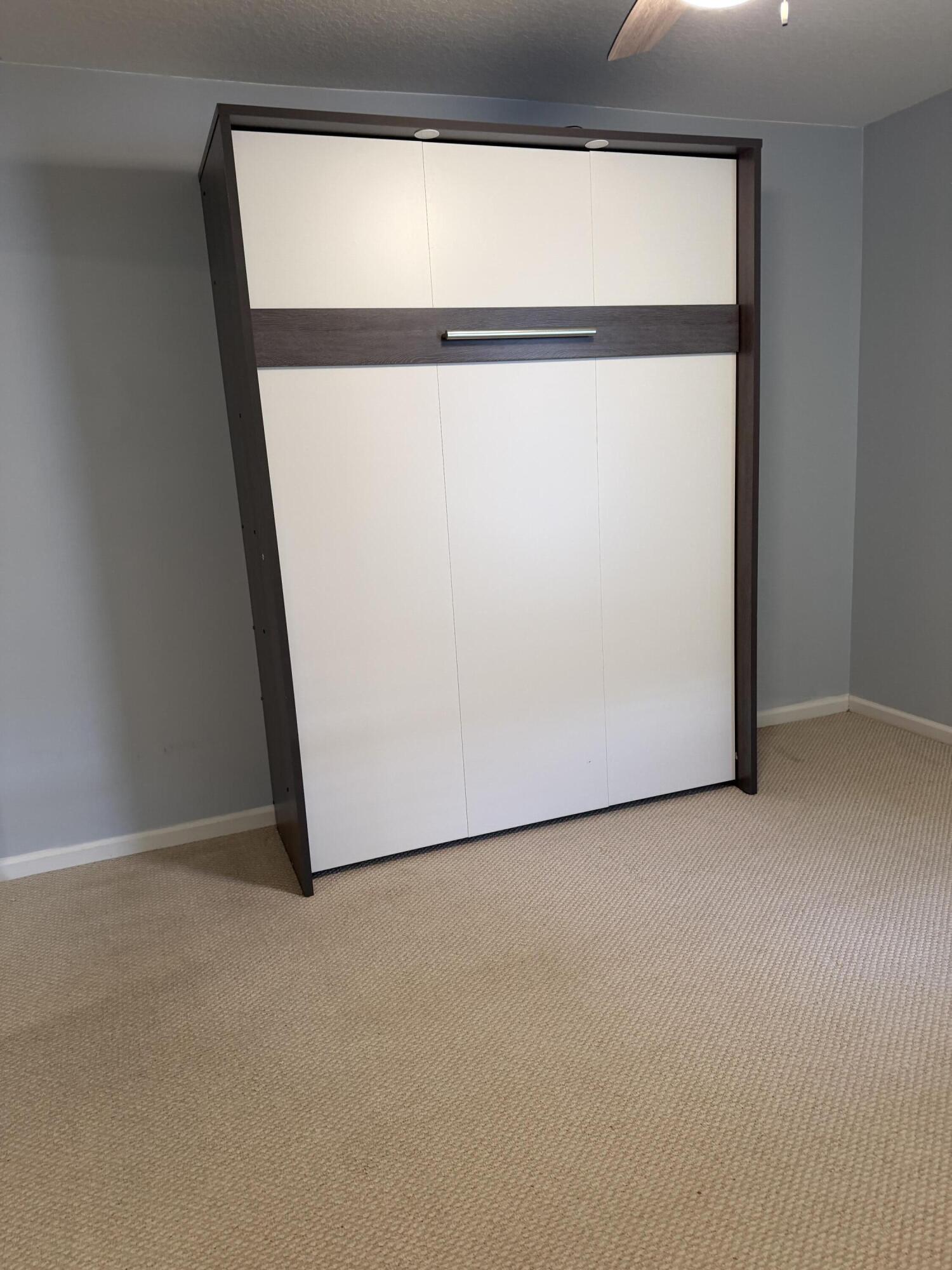 12813 Woodmill Drive Palm Beach Gardens, FL 33418 - Photo 30 of 30 a view of small space with wooden floor