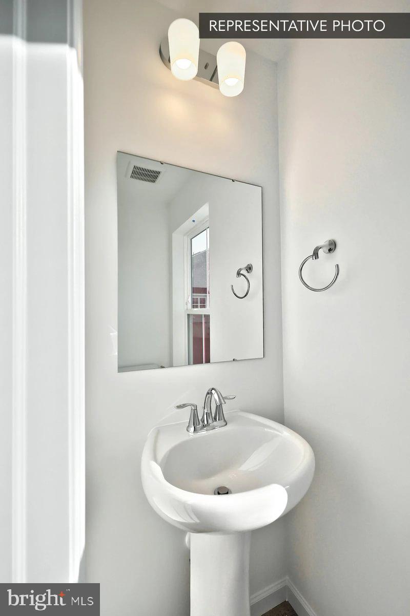 730 Fawn Way Pennsburg, PA 18073 - Photo 13 of 19 a bathroom with a sink and a mirror