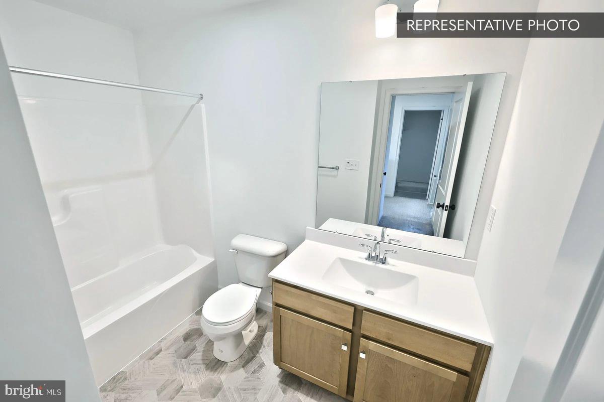 730 Fawn Way Pennsburg, PA 18073 - Photo 15 of 19 a bathroom with a sink a toilet and shower