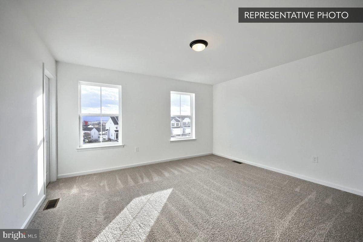 730 Fawn Way Pennsburg, PA 18073 - Photo 16 of 19 a view of a bedroom with window