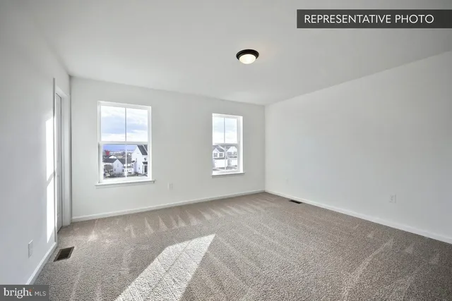a view of a bedroom with window