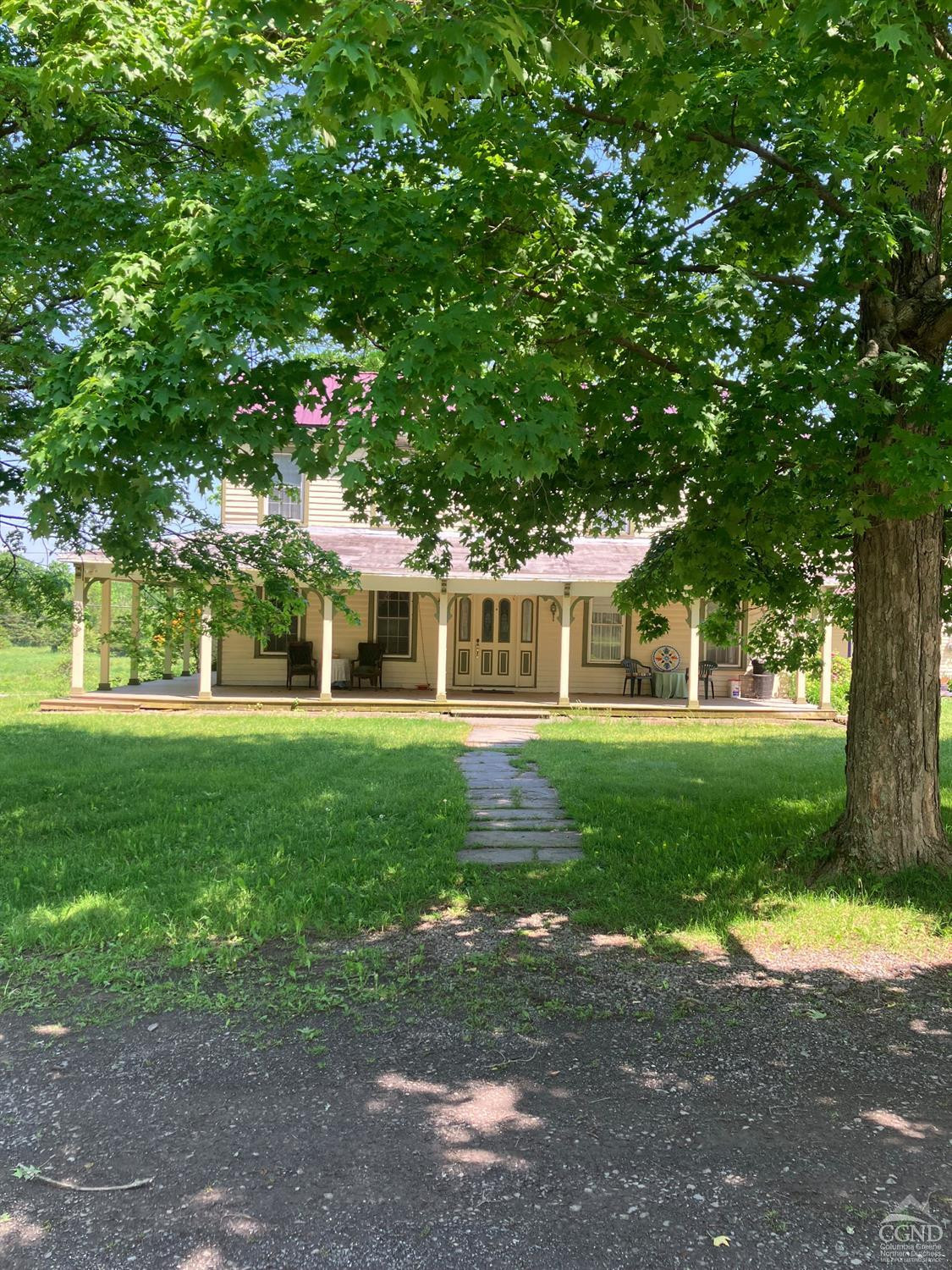 305 Cairo Junction Road Catskill, NY 12414 - Photo 3 of 34 a front view of a house with a yard