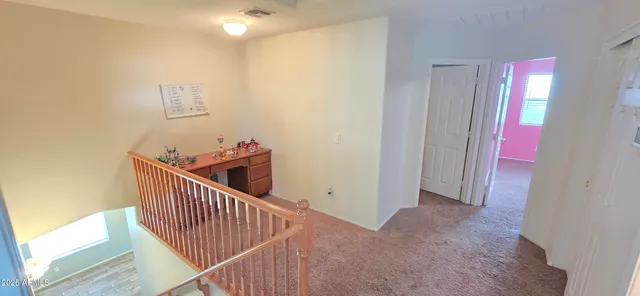 a view of a hallway with entryway