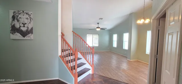 workspace with wooden floor and stairs