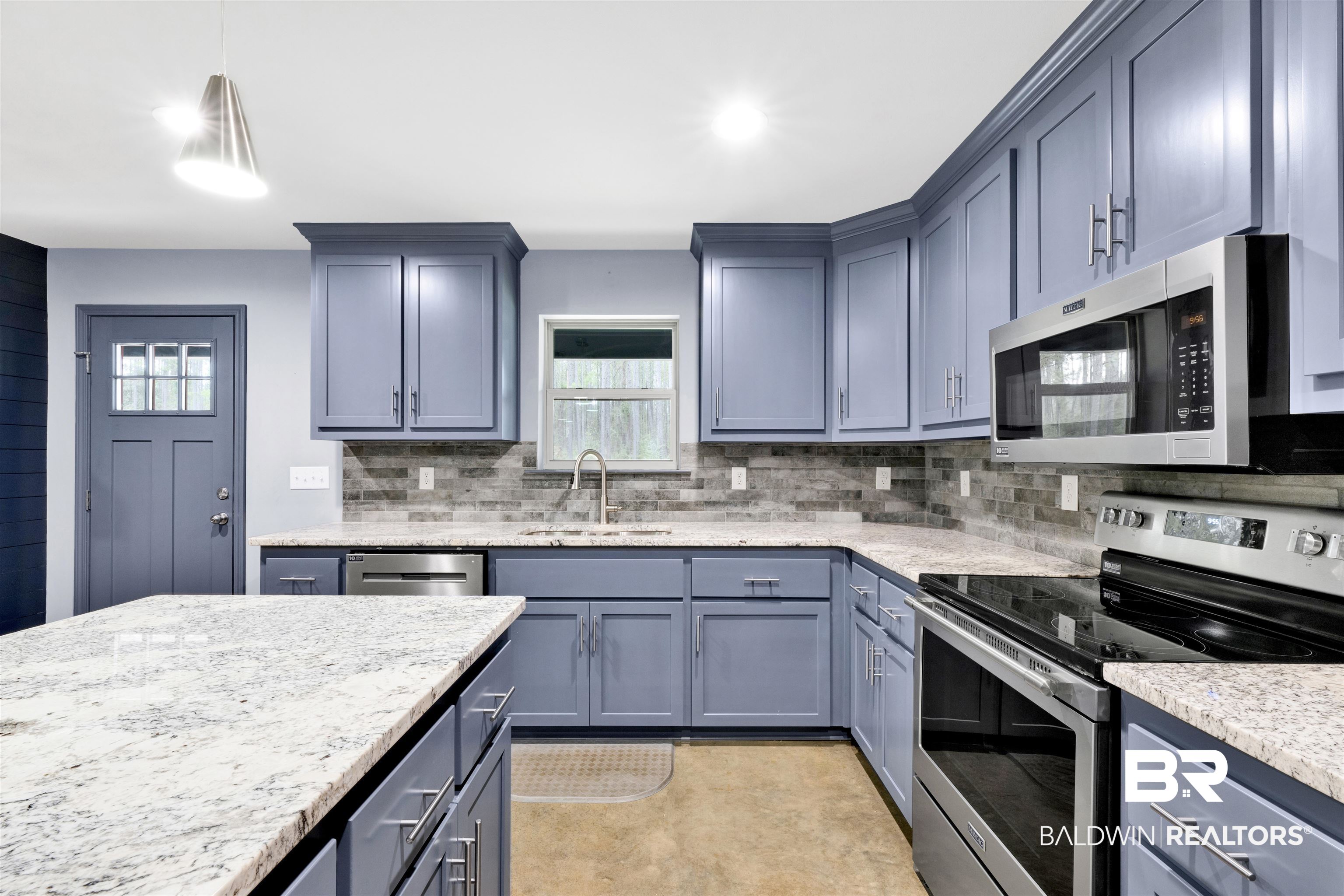 36397 Alexandria Trail Stapleton, AL 36578 - Photo 32 of 65 Kitchen with stainless steel appliances, decorative backsplash, light stone counters, hanging light fixtures, and gray cabinetry