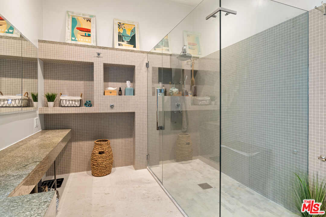 1853 Nichols Canyon Road Los Angeles, CA 90046 - Photo 21 of 48 a kitchen with a refrigerator and countertop