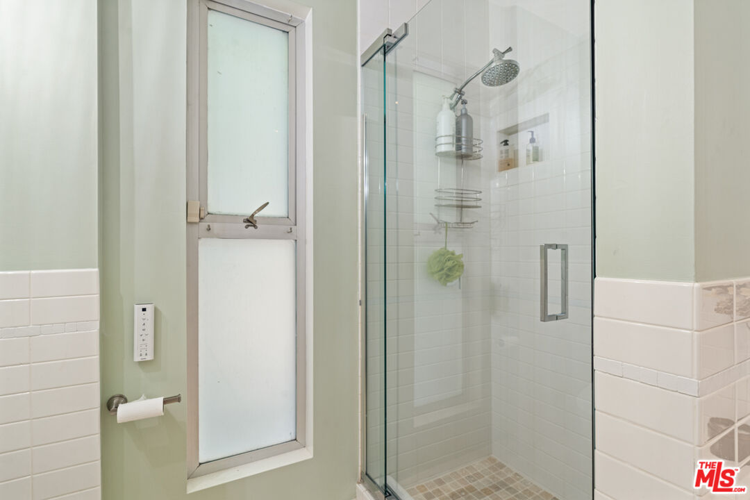 1853 Nichols Canyon Road Los Angeles, CA 90046 - Photo 24 of 48 a bathroom with a shower