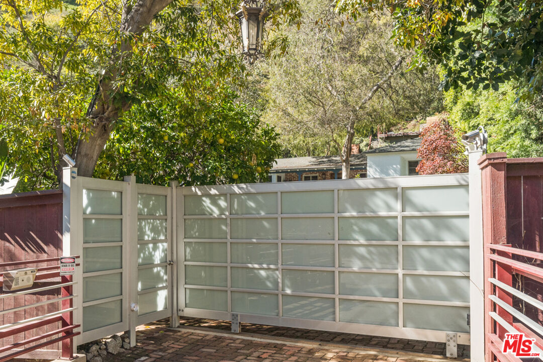 1853 Nichols Canyon Road Los Angeles, CA 90046 - Photo 3 of 48 a view of a house with a tree